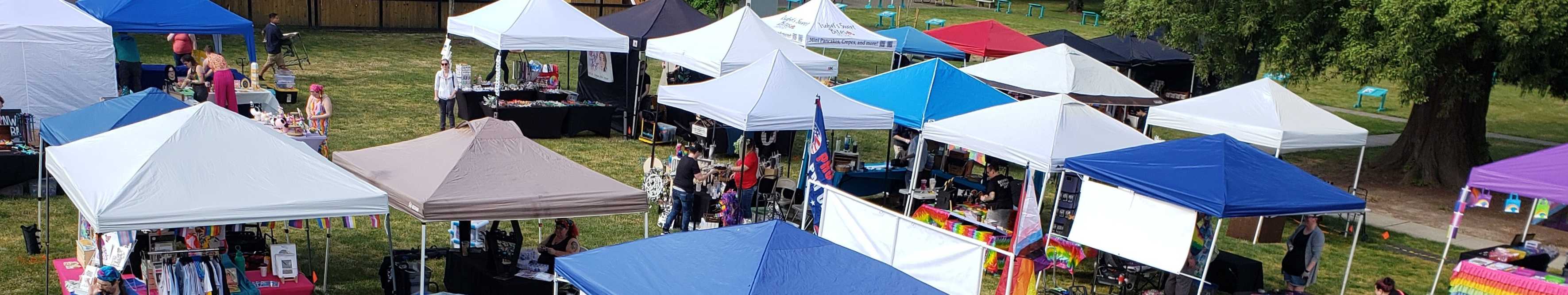 Vendors setting up booths at an event